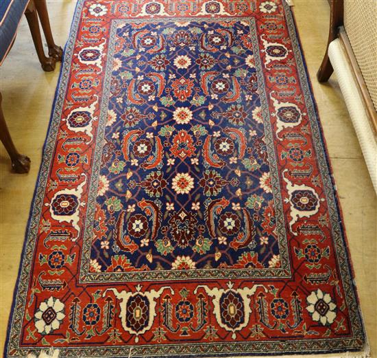 Persian red & blue ground rug